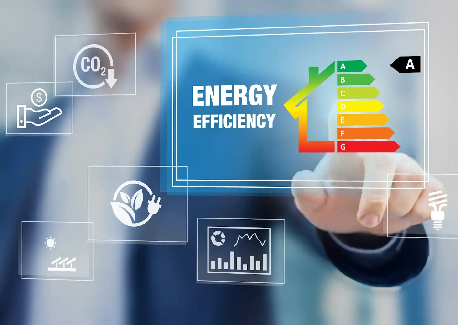 A person interacts with a digital display showcasing energy efficiency ratings and icons
