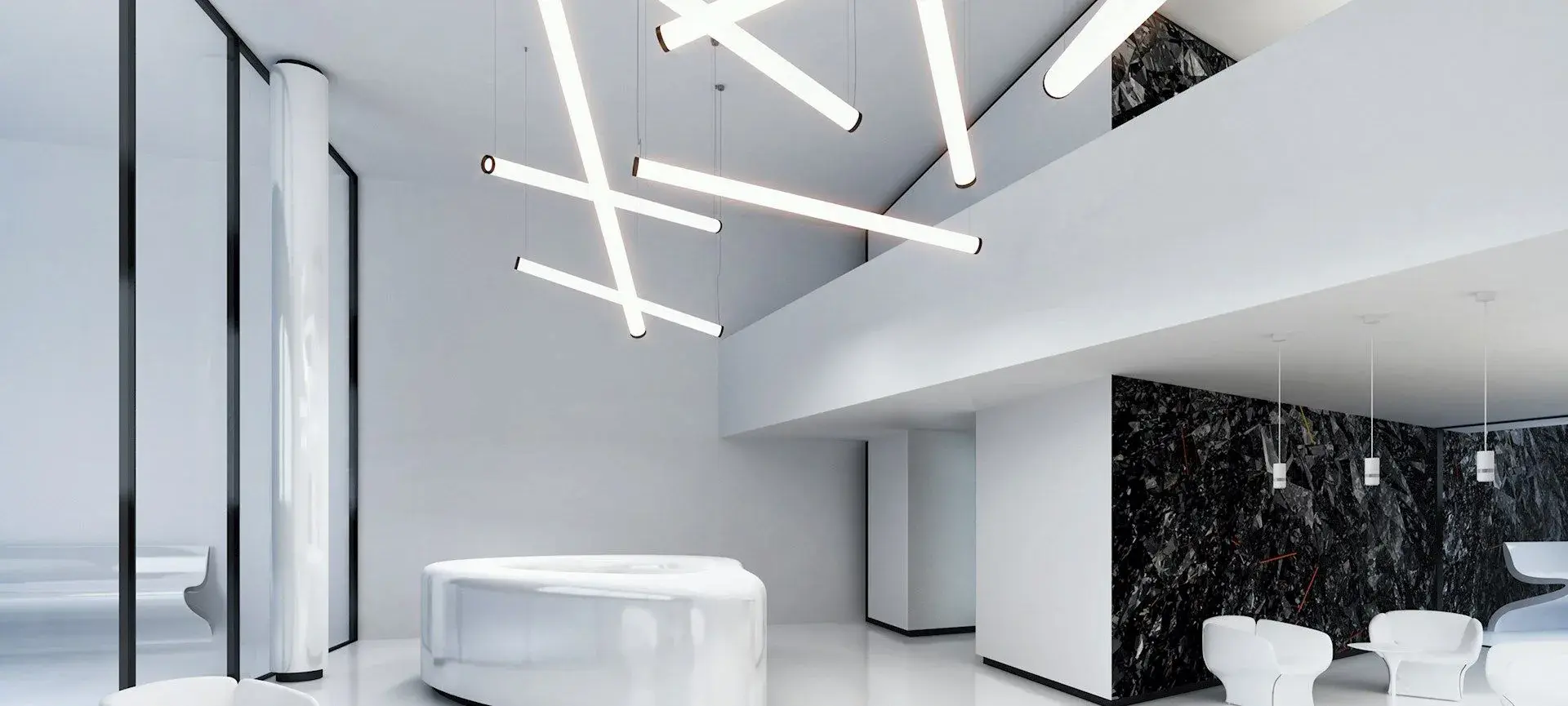 A modern, minimalist space features sleek lighting and a glossy, curved structure